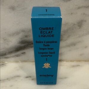 Sisley Ombre Éclat Liquide Eyeshadow in Champagne Blue Box